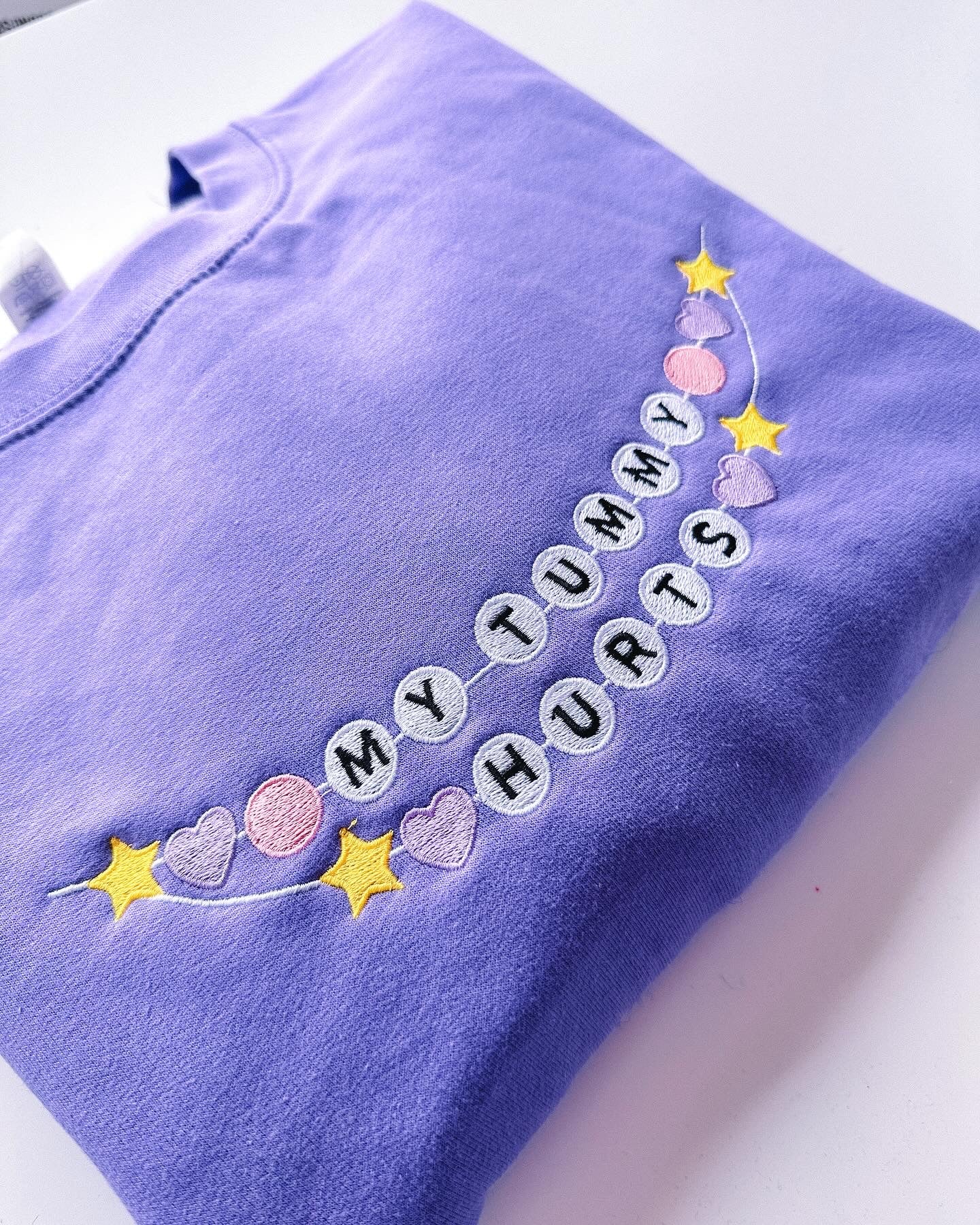 My Tummy Hurts Friendship Bracelet embroidered crewneck sweatshirt